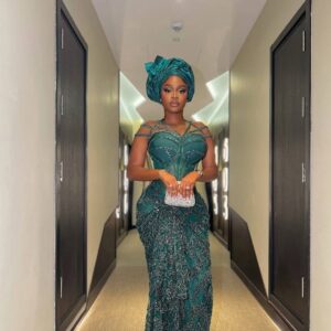 Green beaded traditional dress